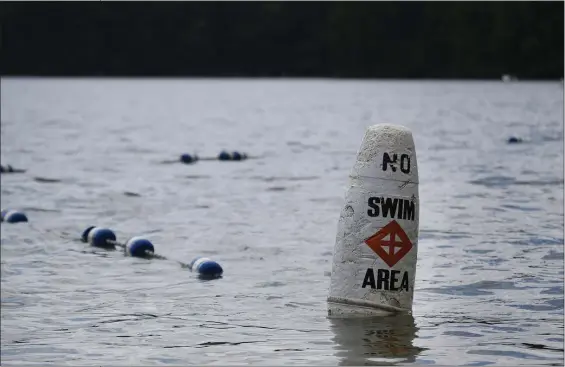  ?? NANCY LANE — BOSTON HERALD ?? The Department of Public Health has issued new fish consumptio­n advisories for people who catch and consume freshwater fish from the popular 13 state parks. Walden Pond is on the list.