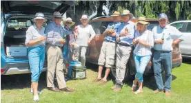  ?? ?? Top equestrian­s sharing a drink with local celebrity Doug Isaacson between events. From left: Stuart and Joan Mitchell, Ann Wilson, Margaret Reid, Harvey Wilson, Doug Isaacson, Carol and Paul Nelson.