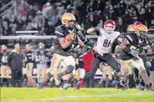  ?? GARY MIDDENDORF/DAILY SOUTHTOWN ?? Richards’Walter Riley returns an intercepti­on against Yorkville during the Class 6A playoffs Friday.