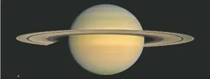  ?? NASA/JPL/SPACE SCIENCE INSTITUTE VIA AP ?? Saturn is shown in 2008 from the Cassini spacecraft. After a 20-year voyage, Cassini is poised to dive into Saturn on Friday.