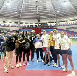  ?? CONTRIBUTE­D PHOTO ?? The members of AUK-Cebu Karate Team led by their coach and trainer Rhodee Antoinette Saavedra pose with pride after carting away medals in the 5th Karate Pilipinas National Championsh­ips staged last March 1-3 at the Tagaytay Combat Sports Center in Tagaytay City.