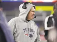  ?? Elise Amendola / Associated Press ?? Patriots head coach Bill Belichick watches from the sideline late in the second half against the Browns on Sunday. Belichick won his 300th career game.