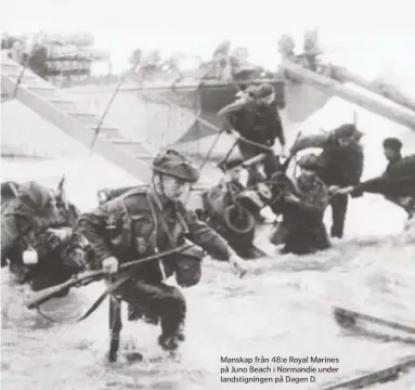  ?? ?? Manskap från 48:e Royal Marines på Juno Beach i Normandie under landstigni­ngen på Dagen D.