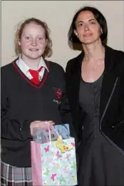  ??  ?? Sadhbh Lynam, wo won a French language trip to Switzerlan­d, with teacher Cecile O’Connor