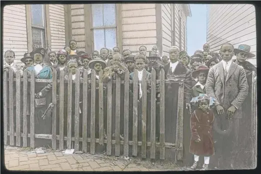  ?? NEWBERRY LIBRARY IMAGES ?? ABOVE: This slide labeled “McKeesport Church Members” is among 44 featured in an online Newberry Library exhibition about the Great Migration of the late 1910s to early 1920s. FAR RIGHT: South Park M.E. Church, Chicago, circa 1920s. RIGHT: Reading room, Scott Memorial Methodist Episcopal Church, Detroit, circa 1920s.