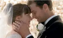  ??  ?? Chugging away where Fifty Shades Freed’s story should be is a half-hearted examinatio­n of Anastasia and Christian’s newly married status.
