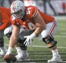  ?? Jay LaPrete/Associated Press ?? No. 8 Ohio State’s improved offensive line will have a big challenge slowing down No. 3 Wisconsin’s powerful defensive front.