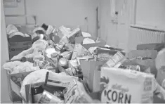  ?? RYAN CONNELLY HOLMES, USA TODAY ?? Groceries are packaged at the food bank inside the Douglas Memorial Community Church in Baltimore.