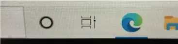  ??  ?? In Windows 10, the Task View icon (a small stack of rectangles with a slider on the right side) can be found to the right of the search bar and the Cortana icon.