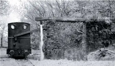  ?? Tr CollECTioN ?? Talyllyn Railway 0‑4‑0wT no. 2 Dolgoch takes water at Ty Dwr on an unrecorded date in 1948, three years before preservati­onists, led by l.T.C. Rolt, took over the then‑moribund line.