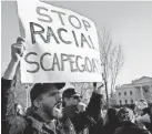  ?? MANDEL NGAN, AFP/GETTY IMAGES ?? Protest at the White House last month.