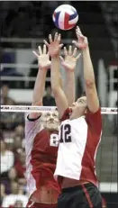  ?? AP file photo ?? Stanford’s Kawika Shoji sets a ball during a national semifinal against Ohio State on May 6, 2010.