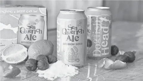  ?? PHOTOS BY DOGFISH HEAD CRAFT BREWERY ?? Dogfish Head began distributi­ng SeaQuench in March; Men’s Health named it an editor’s choice as best low- calorie beer for men.
