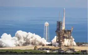  ?? John Raoux / Associated Press ?? A Falcon 9 SpaceX rocket carrying a capsule loaded with science research and ice cream for the internatio­nal space station takes off from Cape Canaveral.