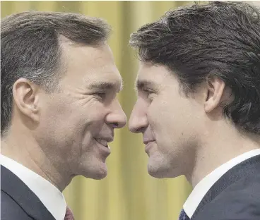  ?? SEAN KILPATRICK / THE CANADIAN PRESS ?? Finance Minister Bill Morneau, left, is in lockstep with his boss, Prime Minister Justin Trudeau, right, on pensions.