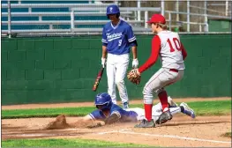  ?? JOSE QUEZADA, HUMEDIA — FOR THE TIMES-STANDARD ?? Matt Letter goes home head first to score a run for the Fortuna Huskies in their win over Ferndale in the first round of the Charles Lakin baseball tournament.