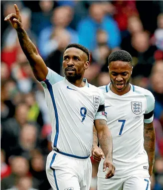  ??  ?? Jermaine Defoe celebrates scoring his goal in England’s 2-0 World Cup qualifying group win over Lithuania.