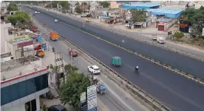  ?? — PTI ?? Delhi- Gurugram Expressway near Kherki Daula Toll Plaza wears a deserted look during the lockdown on Tuesday.