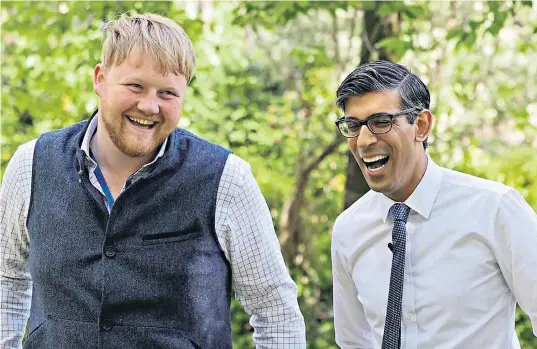  ?? ?? Rishi Sunak shares a laugh with Kaleb Cooper, of Clarkson’s Farm fame. Cooper later said that he thought the Prime Minister ‘100 per cent’ understood farming