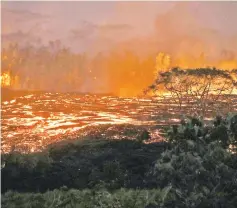  ??  ?? Lava from a Kilauea volcano fissure flows on Hawaii’s Big Island. — AFP photo