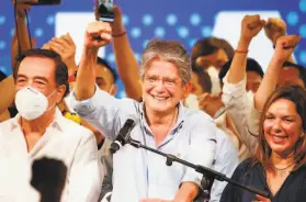  ?? Angel Dejesus / Associated Press ?? Guillermo Lasso addresses supporters late Sunday in the port city of Guayaquil after defeating Andres Arauz in the presidenti­al runoff election.