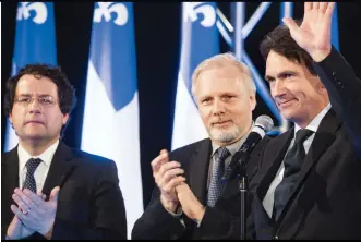  ??  ?? Le soir du 7 avril dernier, Bernard Drainville, Jean-François Lisée et Pierre Karl Péladeau réconforta­ient les militants sonnés par la défaite. Tous ont alors compris qu’ils seraient de la course à la succession de Pauline Marois.