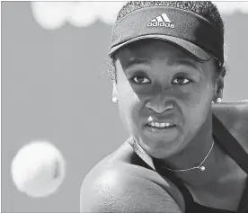  ?? JASON DECROW THE ASSOCIATED PRESS ?? Naomi Osaka, pictured, won, 6-1, 6-1, against Lesia Tsurenko on Wednesday, reaching her first U.S. Open semifinal.