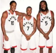  ?? RON TURENNE/GETTY IMAGES ?? From left, DeMar DeRozan, Kyle Lowry and DeMarre Carroll of the Raptors look to overcome last season's disappoint­ing first-round sweep by Washington in the playoffs.