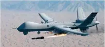  ??  ?? MQ-9无人机发射AGM-114“地狱火”导弹