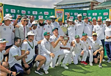  ??  ?? Members of the South Africa team celebrate after winning the final Test against Australia in Johannesbu­rg on Tuesday.