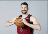  ?? RON SCHWANE — THE ASSOCIATED PRESS ?? Kevin Love, shown during media day last month, is excited to lead the Cavaliers this season.