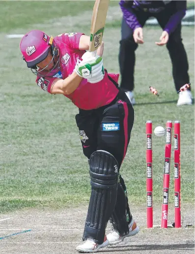  ?? ?? Sydney Sixers’ Alyssa Healy is bowled by Hobart Hurricanes’ Belinda Vakarewa. Picture: Getty Images