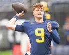  ?? KIRBY LEE/USA TODAY SPORTS ?? Quarterbac­k J.J. McCarthy is 26-1 as a starter and led Michigan to two Big Ten titles.