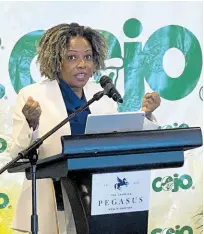  ?? PHOTO BY AINSWORTH MORRIS ?? Senator Dr Dana Morris Dixon, minister without portfolio in the Office of the Prime Minister with responsibi­lity for digital and skills transforma­tion, gives her address during the annual Children of Jamaica Outreach Scholarshi­p Luncheon, held on Wednesday at The Jamaica Pegasus hotel in New Kingston.