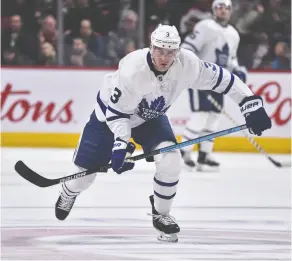  ?? Minas
Panagiotak­is
/ Gett
y Imag
es files ?? Maple Leafs defenceman Justin Holl expects he’ll drive back
to Toronto from Minnesota should the NHL resume.