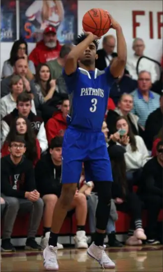  ?? RANDY MEYERS — FOR THE MORNING JOURNAL ?? Trey Brooks of Open Door lines up a 3-pointer against Firelands during the second quarter on Feb. 9.