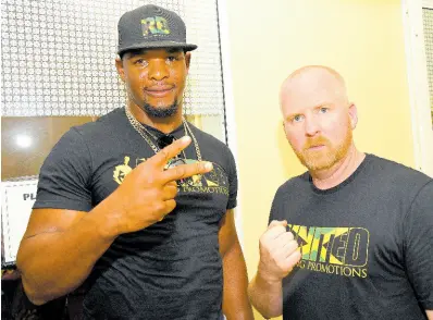  ?? FILE ?? Ricardo ‘Big 12’ Brown (left) and his promoter, Tyler Buxton.
