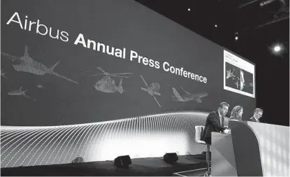  ?? FREDERIC SCHEIBER AP ?? Airbus Chief Executive Officer Guillaume Faury (left) at Airbus’ annual press conference on Thursday in Toulouse, France.