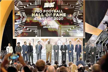  ?? AP Photo/David J. Phillip ?? ■ The Hall of Fame Class of 2020 stands on stage at the NFL Honors football award show Saturday in Miami.
