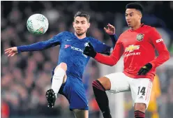  ??  ?? Man on: Jorginho battles for possession with Jesse Lingard