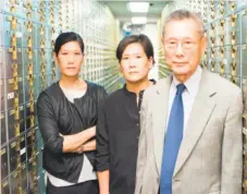  ?? Sean Lyness ?? Above: Filmmaker Steve James says his documentar­ies are character studies that depict a broader context. Right: Vera Sung (left), Jill Sung and Thomas Sung in James’ new documentar­y “Abacus: Small Enough to Jail.”