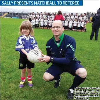  ??  ?? Sally Rowlette from St Farnan’s presents the matchball to referee of the Intermedia­te final, Colm Gunning.