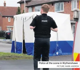  ??  ?? Police at the scene in Wythenshaw­e