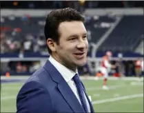  ?? MICHAEL AINSWORTH - THE ASSOCIATED PRESS ?? In this Nov. 5, 2017, file photo, CBS football analyst Tony Romo walks across the field during warmups before an NFL football game between the Kansas City Chiefs and the Dallas Cowboys in Arlington, Texas.