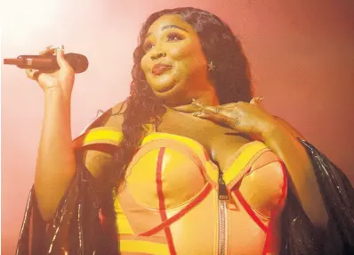  ?? AP ?? This September 18 file photo shows Lizzo performing at The Met in Philadelph­ia. Lizzo earned eight Grammy Award nomination­s yesterday, making her the show’s top-nominated act.