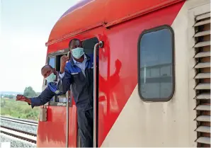  ?? ?? Crew members conduct safety check on a train on Mombasa-nairobi Standard Gauge Railway in Nairobi, Kenya, on March 25