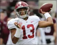  ?? (AP/Sam Craft) ?? The Miami Dolphins looked past Tua Tagovailoa’s long injury history by using their first selection to pick him fifth overall Thursday. Tagovailoa threw 76 touchdown passes in 24 starts the past two seasons at Alabama.