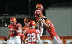  ?? BEA AHBECK/NEWS-SENTINEL ?? Lodi’S Andreas Pappas (12) celebrates his touchdown with teammate Myles Lozano during the Flames’ game against Chavez at the Grape Bowl on Aug. 31.