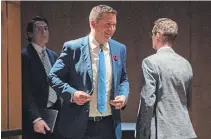  ?? JUSTIN TANG THE CANADIAN PRESS ?? Conservati­ve Leader Andrew Scheer leaves a room after participat­ing in a vote for caucus chair, during a caucus meeting on Parliament Hill in Ottawa, on Wednesday.