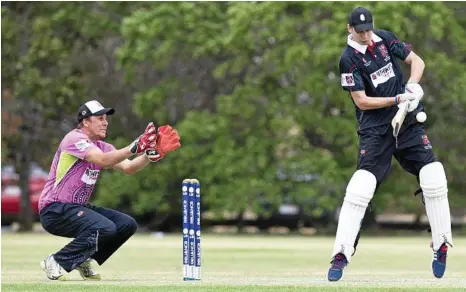  ??  ?? CLASH: Cameron Moodie keeps for Maranoa Hurricanes while Gareth Polzin bats for the SWIN Seamers Academy side in the 2017 Western Rivers Cup in Toowoomba at the weekend. PHOTOS: NEV MADSEN